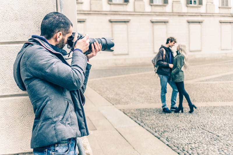 guy takes stolen shot from the couple